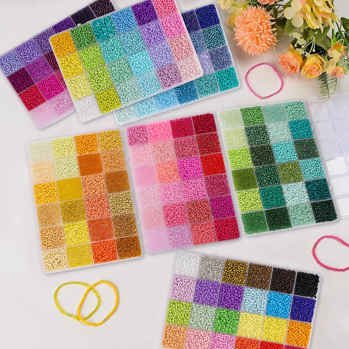 مجموعة خرز زجاج ملون على شكل حبات أرز ٣ مم - ٢٤ عُلبَة (٦.٥ غرام/عُلبَة ≈٥٢٠٠ قطعة) لصنع أساور وقلادات يدوية