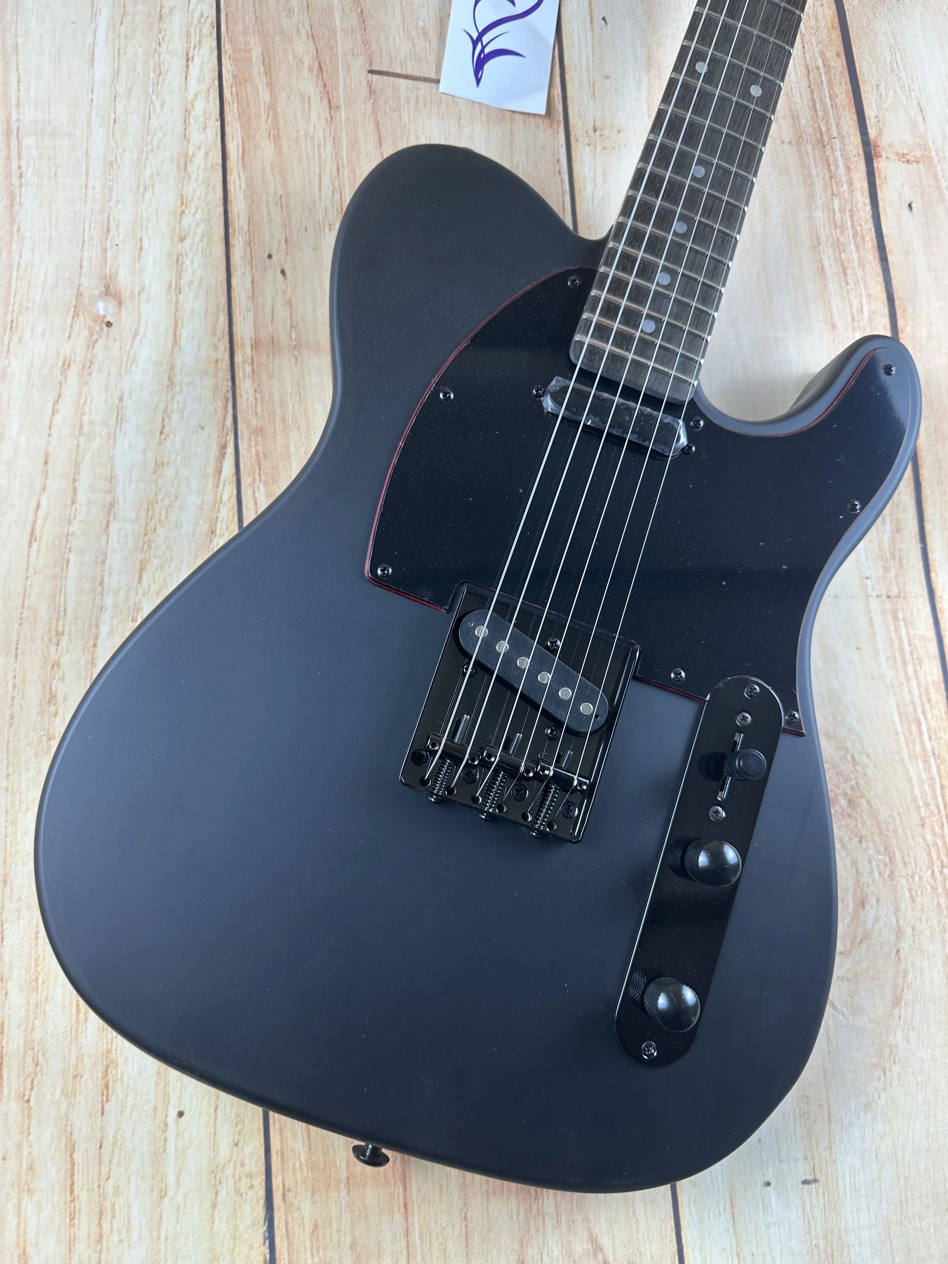 Telecast Electric Guitar, Matte black imported paint, red logo and red body edging, imported alder body, Canadian maple neck, li