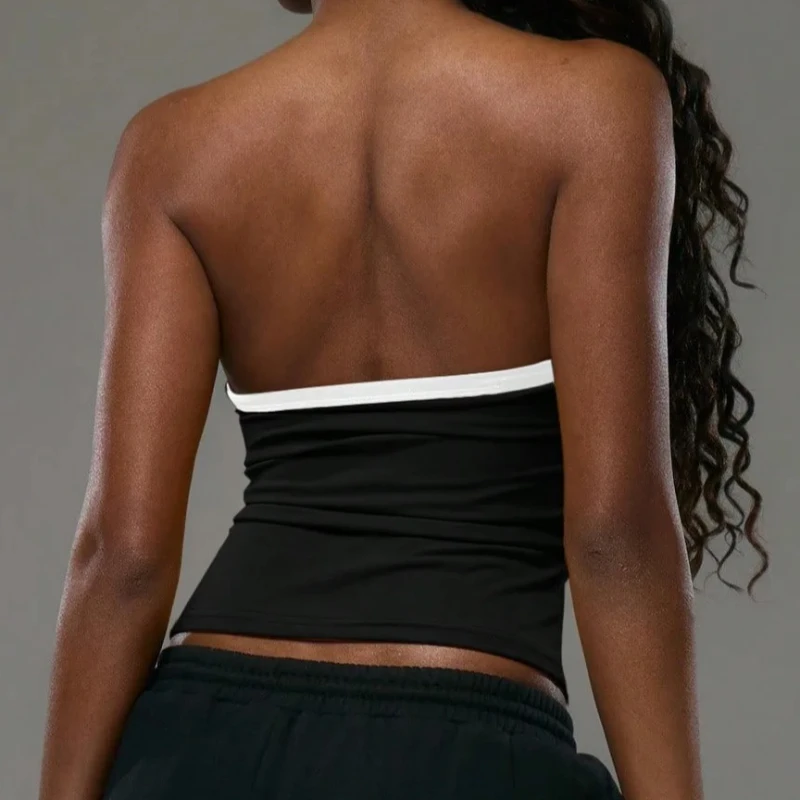 Ragazza calda europea americana con coulisse e lacci, bustier con ombelico esposto, top senza spalline, gilet casual dimagrante con stampa di numeri sexy