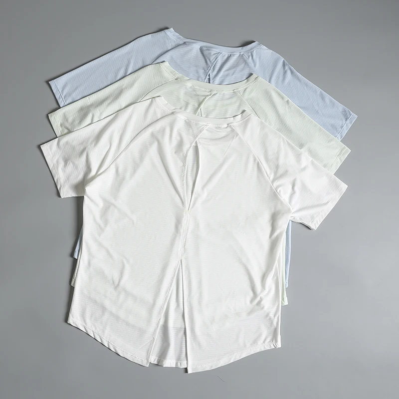 

Yoga suit short-sleeved women's summer loose breathable morning jogging T-shirt top hollow quick-drying Pilates yoga blouse