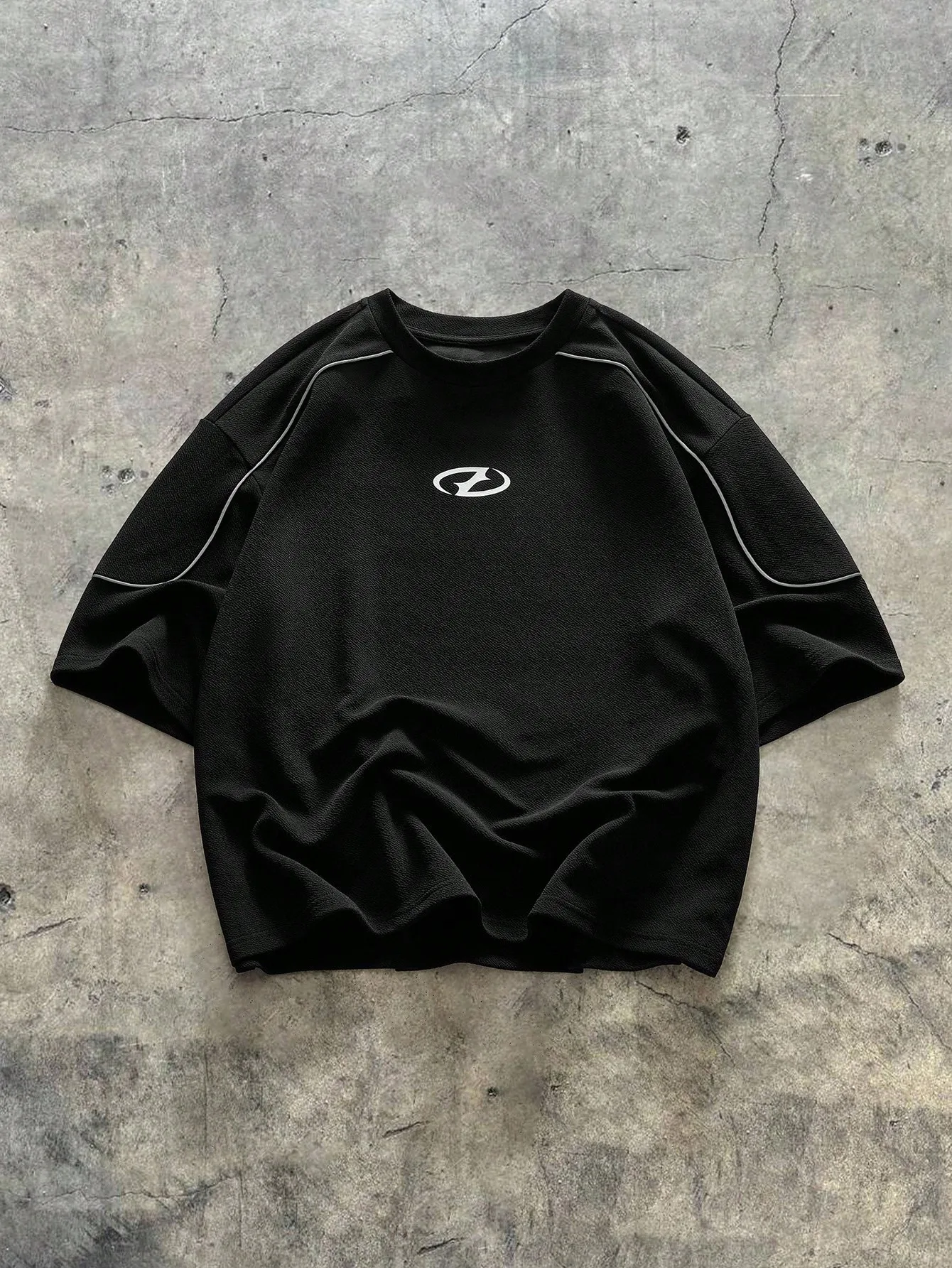 

Men's Black Knit Loose Fit Short Sleeve Tee with Reflective Trim