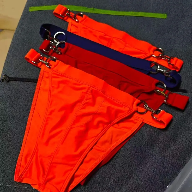 2026 Fashion seaside beach bilateral buckle swimming trunks European and American sports side open  low waist swimsuit 10101