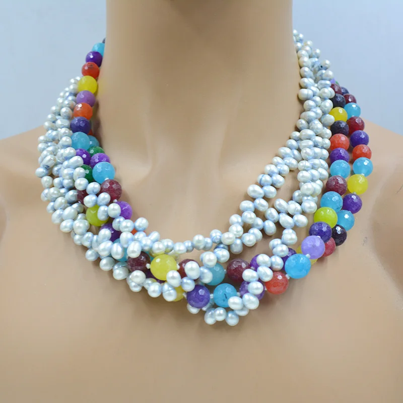 

3 strands 6MM AAA natural baroque pearls. 2 strands of 10MM semi-precious stone necklace 53CM