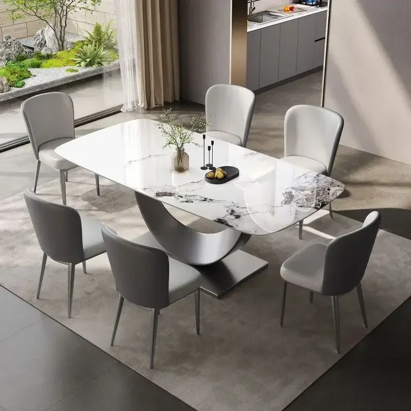 Light luxury Italian style, high-end bright rock slab dining table and chair combination modern simple small apartment household