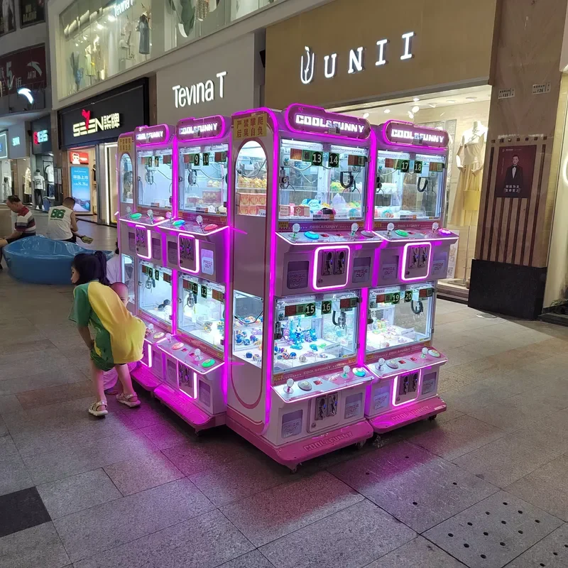 Mini Claw Machine for 4 Players Coin Operated Arcade Game for Arcade Retail Store Lifetime Technical Support Mini Crane Pink