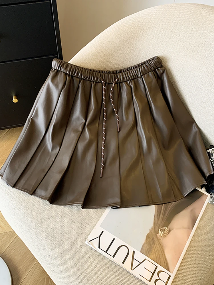 

Короткая юбка из искусственного материала с высокой талией на шнуровке для женщин, осеннее однотонное платье трапециевидной формы с эластичной резинкой на талии, винтажные юбки для поездок на работу