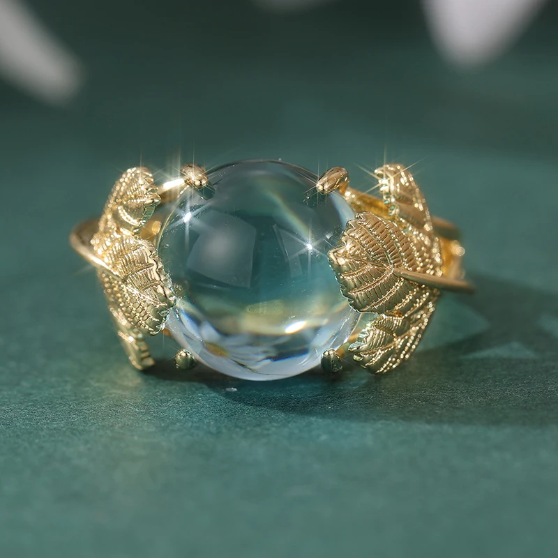 Vintage-Ring für Damen in Goldfarbe mit eingelegtem meerblauen Stein, Blatt- und geometrischer Schnitzerei, für den täglichen Gebrauch, Partyschmuck – Detail 2