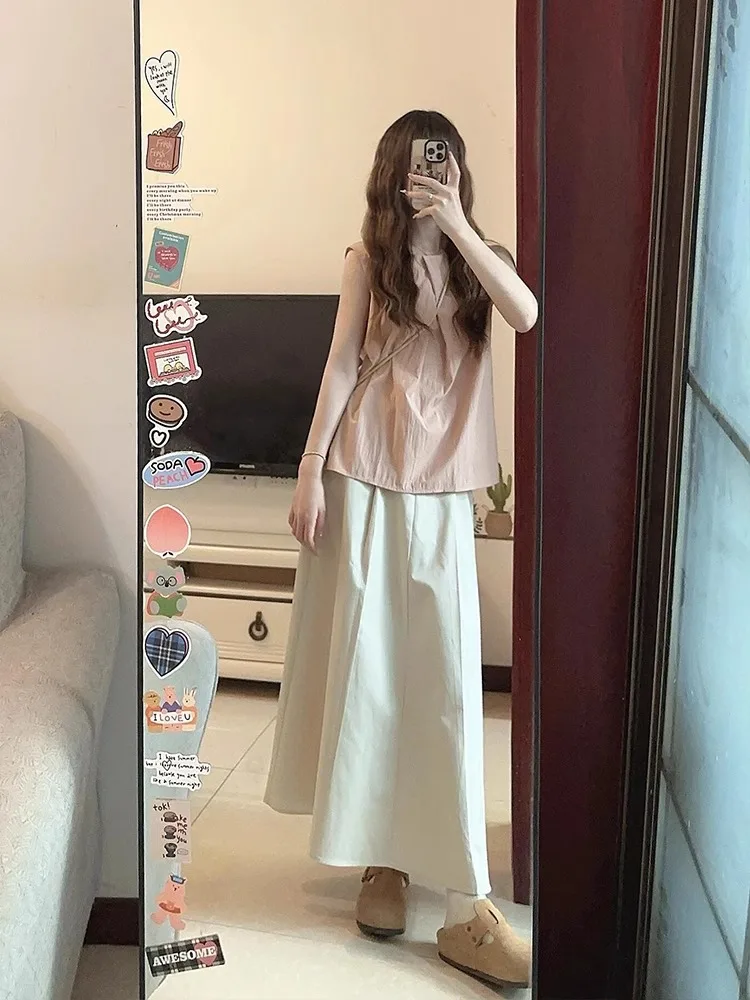 

Летний повседневный женский комплект 2025: Новинка, свободный крой, стройнящий эффект, топ и юбка макси, комплект из двух предметов