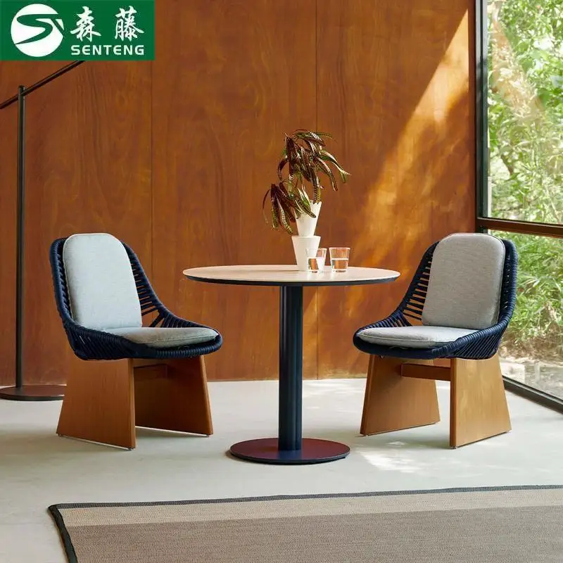

Nordic outdoor tables and chairs courtyard outdoor waterproof waterproof hotel model room master design balcony solid wood furni