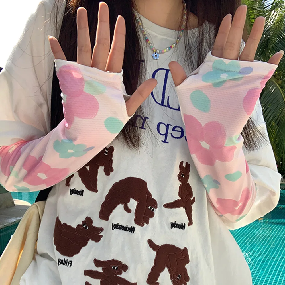 ปลอกแขนป้องกันรังสียูวีของผู้หญิงแขนยาวติดโบว์กันหนาวแขนถุงมือครึ่งนิ้วยาวสำหรับขับรถฤดูร้อน