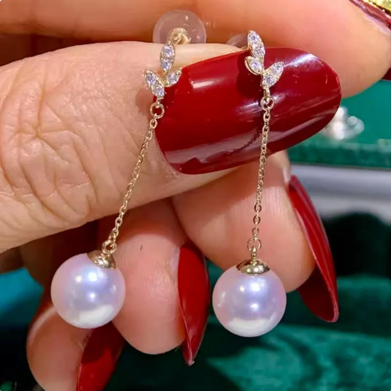 Beautiful temperament AAAA natural 10-11mm round white South China Sea pearl earrings 925 silver