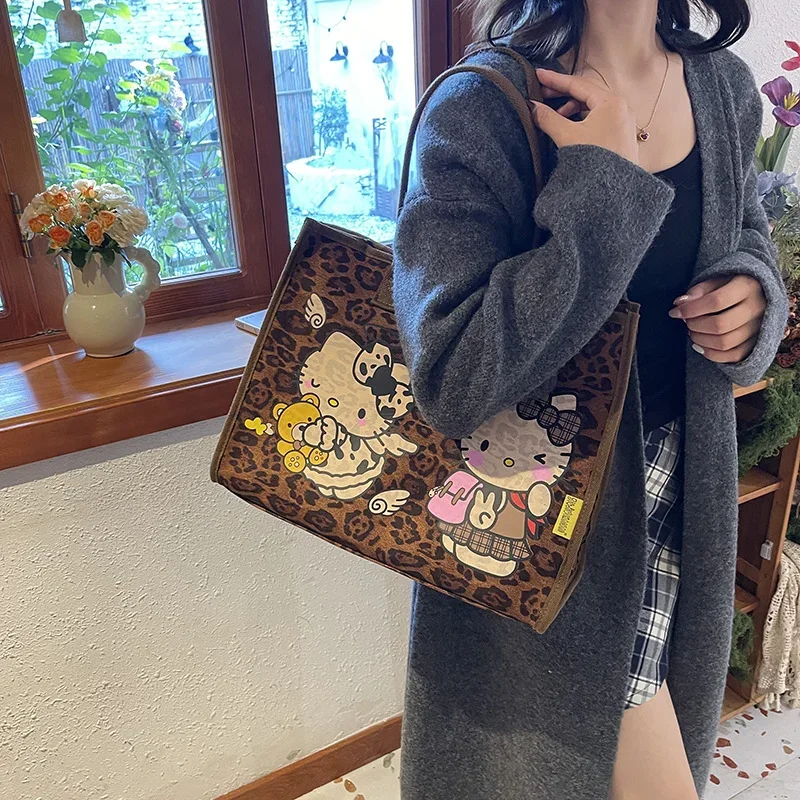 Sanrio Hello Kitty tas kanvas wanita, kapasitas besar Vintage pola macan tutul tas belanja lucu kartun tas Tote tas tangan bahu