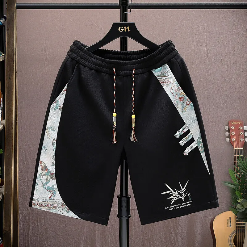 

Лето 2025: новые мужские высококачественные шорты в китайском стиле с принтом «пять четвертей», свободные и модные повседневные спортивные шорты