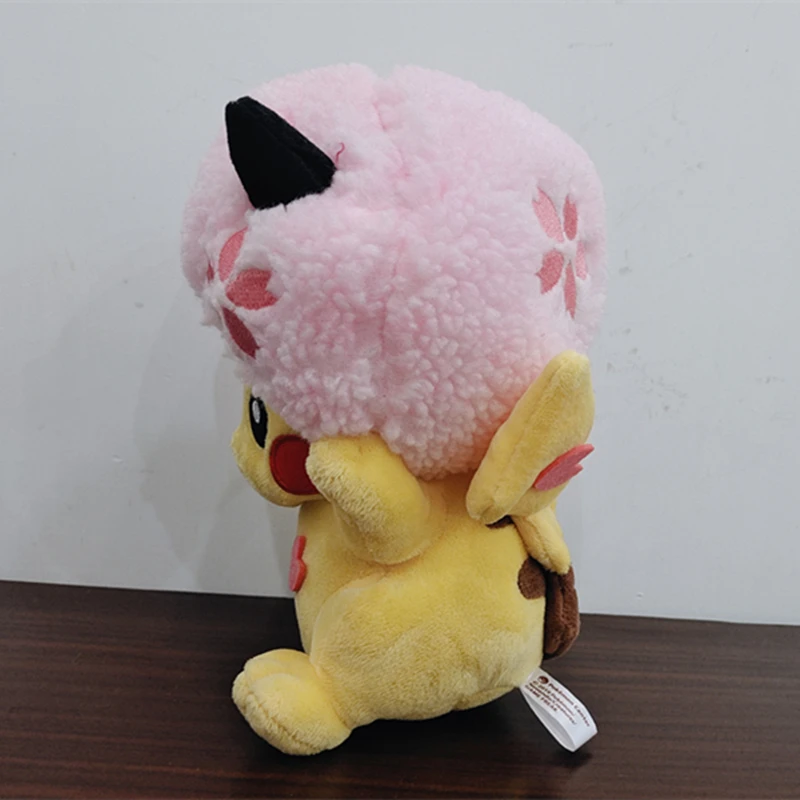 Novo pikachu sakura bonito pokemon brinquedos de pelúcia sentado boneca animação travesseiro macio em torno das crianças presentes