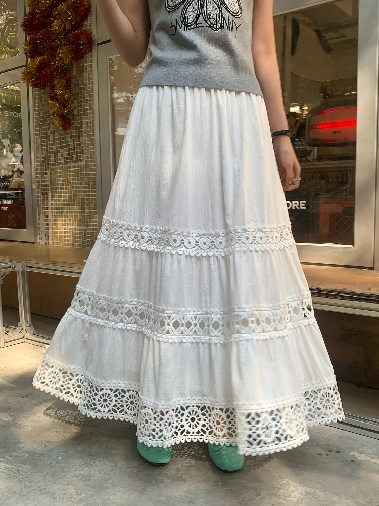 Boho oeillet dentelle broderie ourlet jupe longue d'inspiration vintage été a-ligne jupe à plusieurs niveaux avec taille élastique vacances à la plage