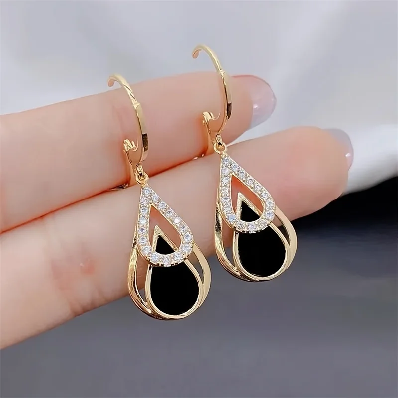 Creative and fashionable black hollowed-out double-layer teardrop earrings, featuring a new sparkling design with a sophisticate