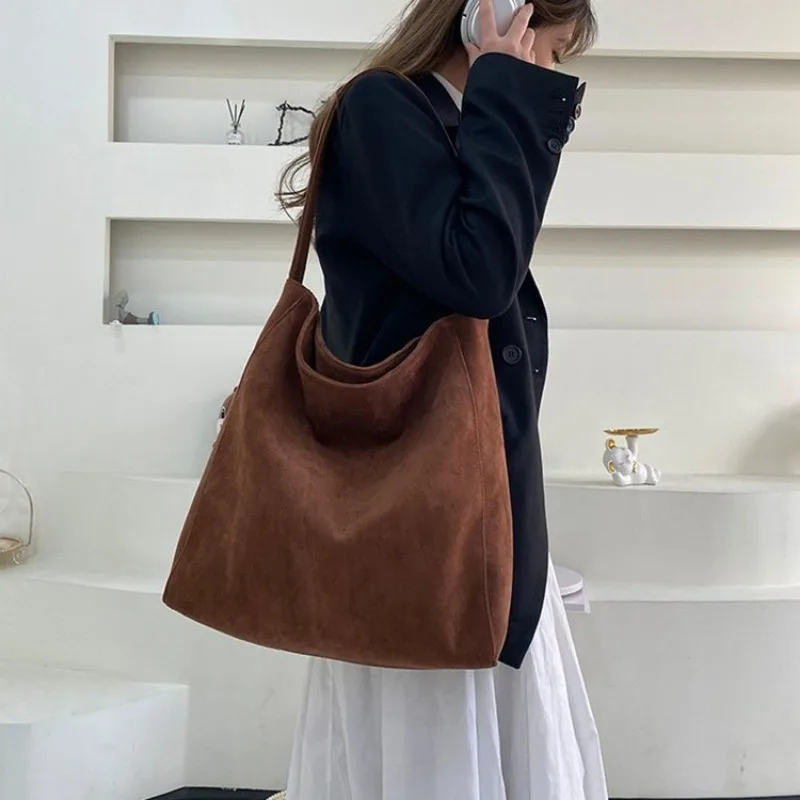 

Minimalist Luxury Diaper Bag Handbag One Shoulder Travel Getaway Exquisite Sleek Practical Trendy Chic Functional Timeless
