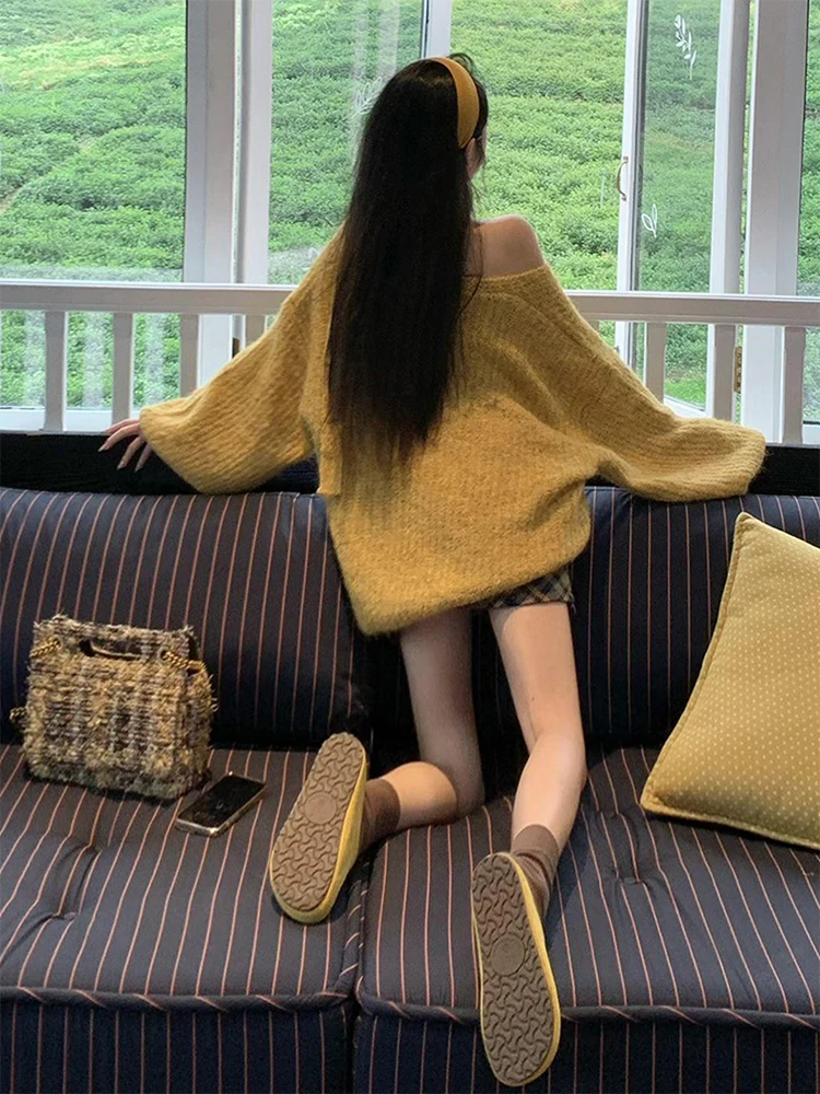 黄色のロングニットセーター レディース ゆったり ラフ スリーブレス デザイン 秋冬 韓国風 ルーズフィットトップ