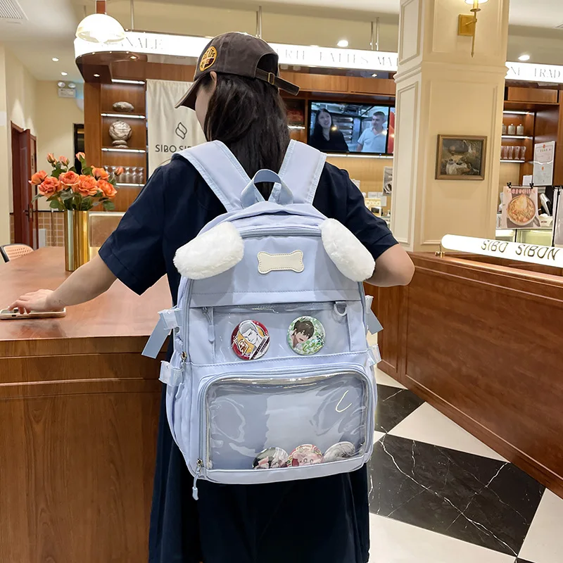 Fresh and cute little dog backpack, transparent pain bag, computer bag, regular school bag, and large capacity backpack