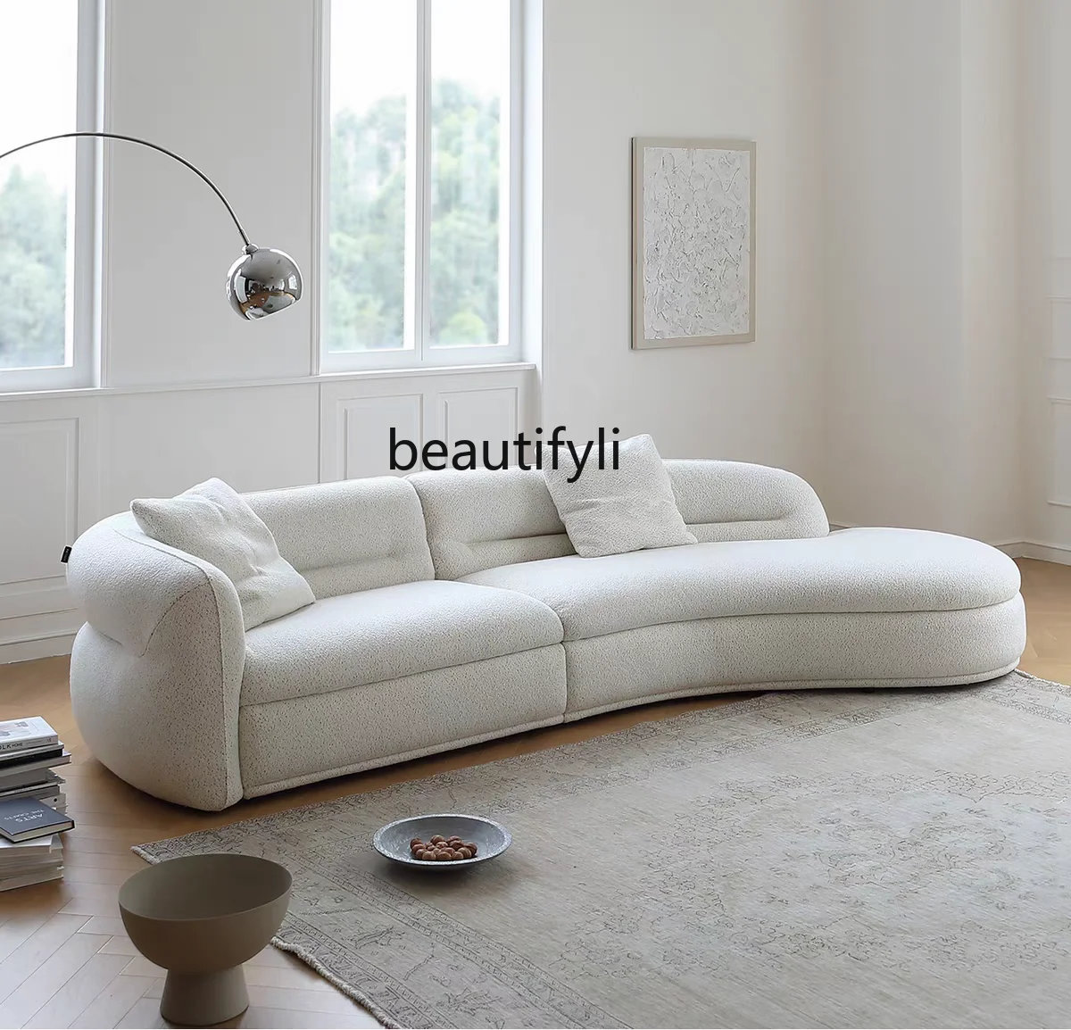 

Italian light luxury living room high-end sofa curved moon sofa cream wind front desk
