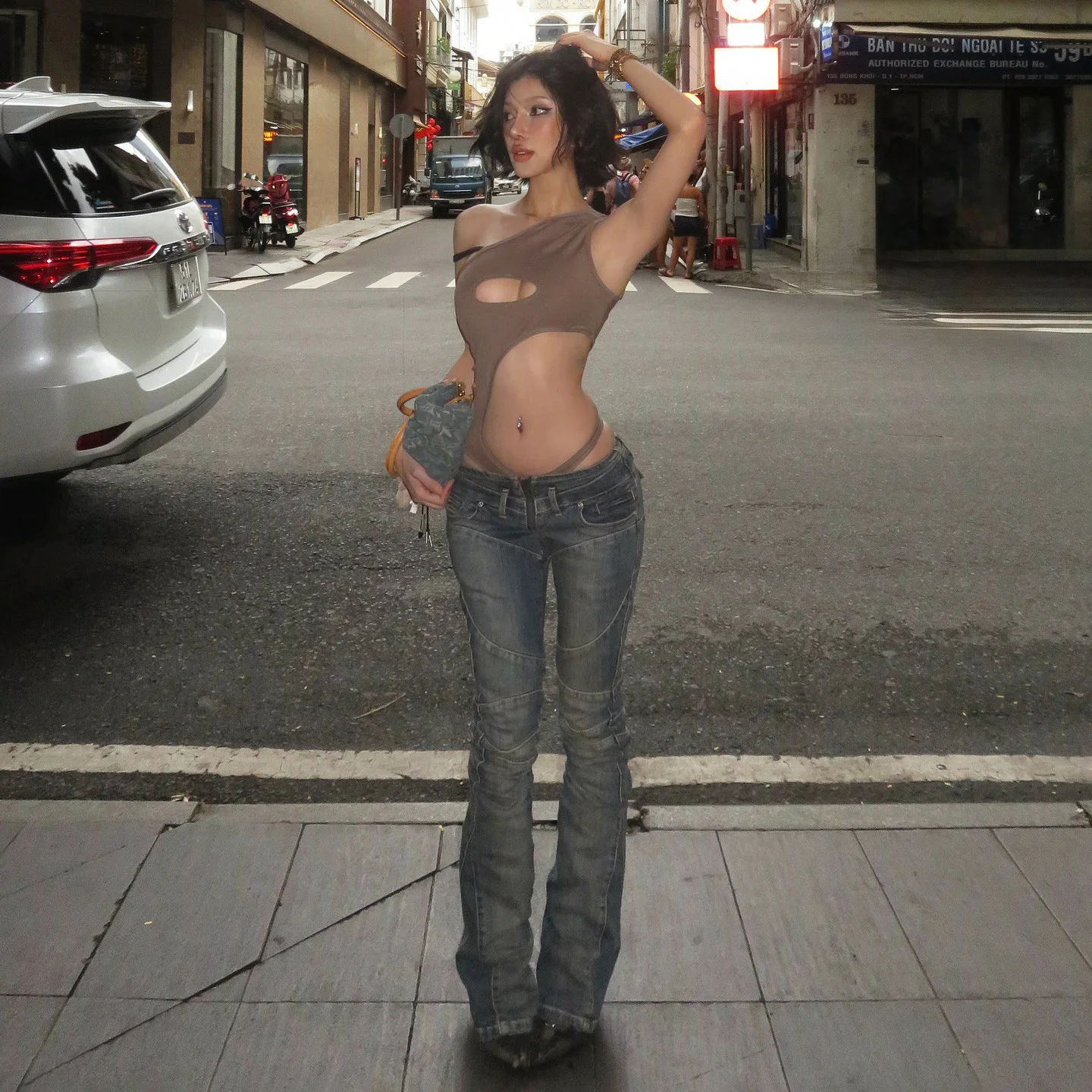 Vaqueros largos divididos de estilo retro de calle americana con un diseño sexy de pierna recta informal ajustado de tiro bajo