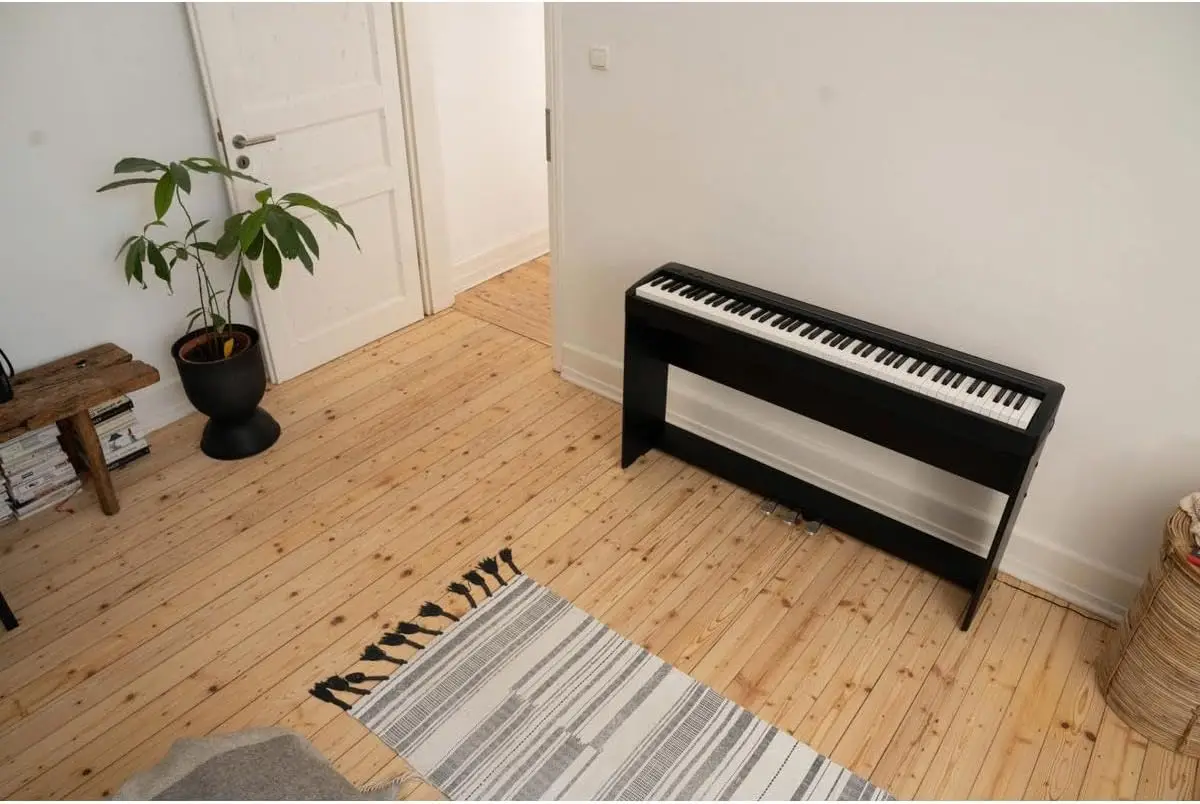 Black 88-Key Digital Piano Featuring Integrated Speakers