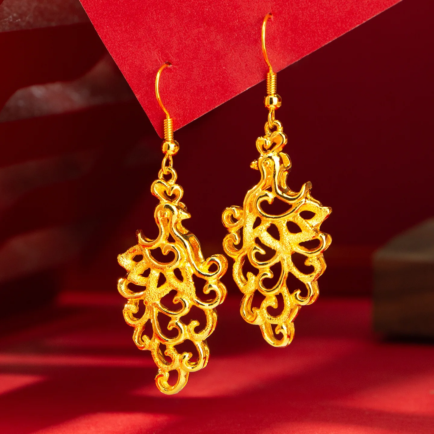 9999 gold hollow phoenix-shaped earrings for ladies, light luxury fashion bird-shaped earrings, wedding accessories