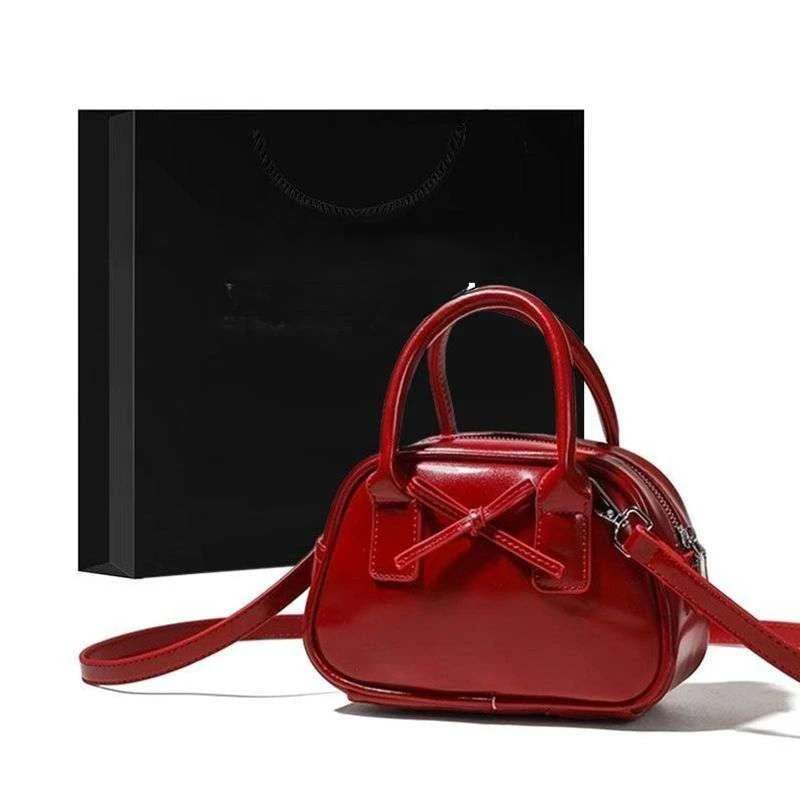 2026 حقائب كتف عصرية جديدة ذات قيمة عالية حقيبة ساعي البريد ذات إحساس عالي على الطراز الأجنبي حقيبة يد البولينج #1