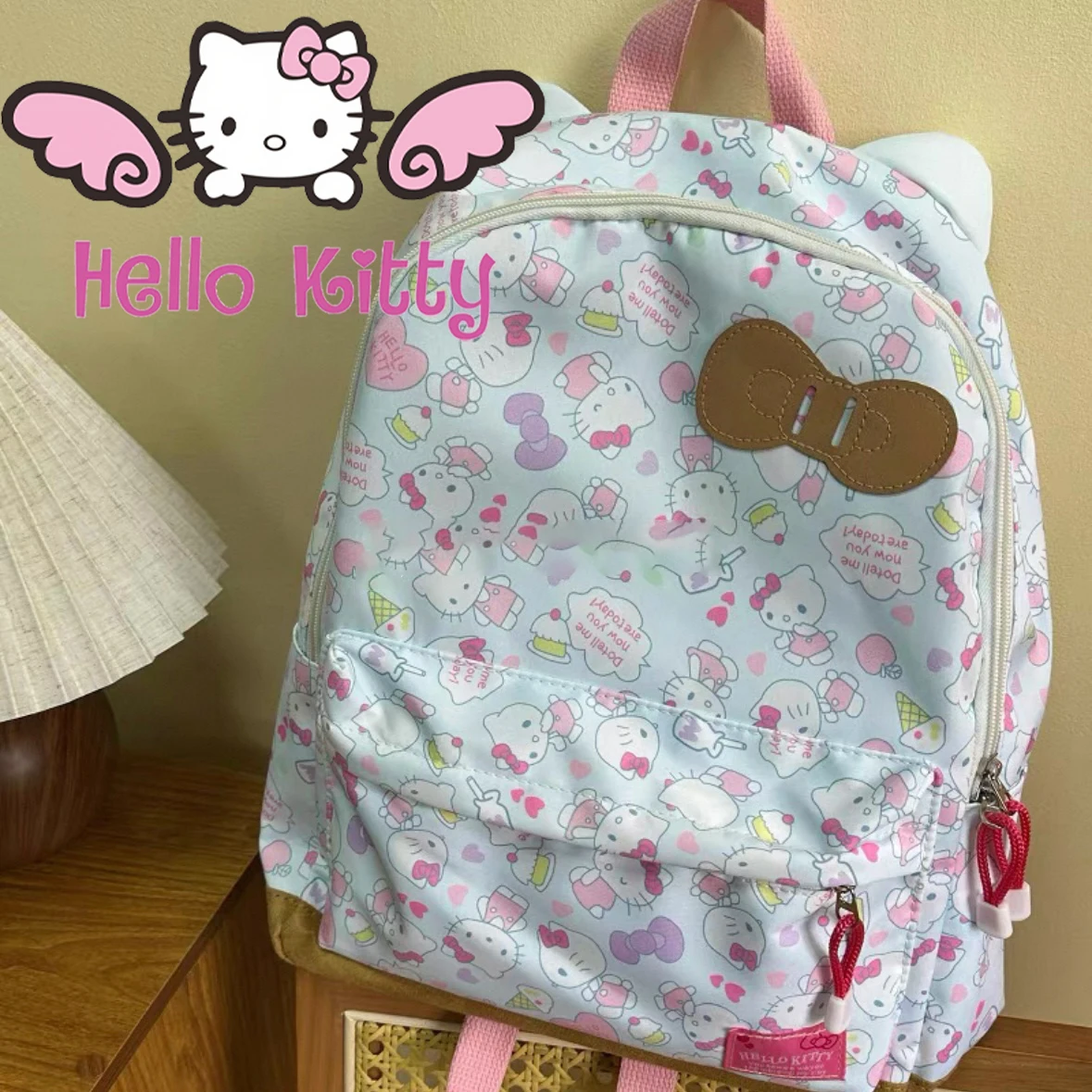 

Japanese style Hello kitty Bow shaped backpack high quality Cute printing self-made large capacity student cartoon schoolbag