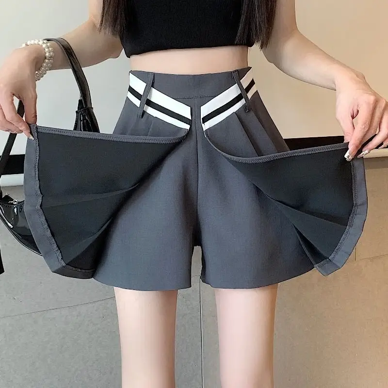 Koreańskie letnie krótkie spódniczki damskie nieregularne plisowane zamek błyskawiczny Patchwork moda na co dzień wysokiej talii luźna szeroka nogawka spódnica trapezowa szorty