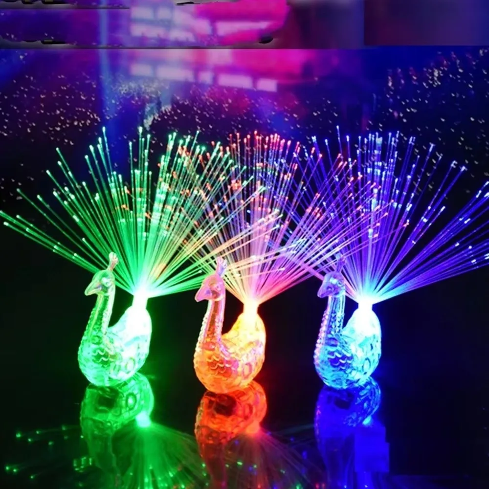 Nuovo lampeggiante LED dito pavone luce incandescente carino dito luce schermo aperto giocattoli luminosi decorazioni per la casa