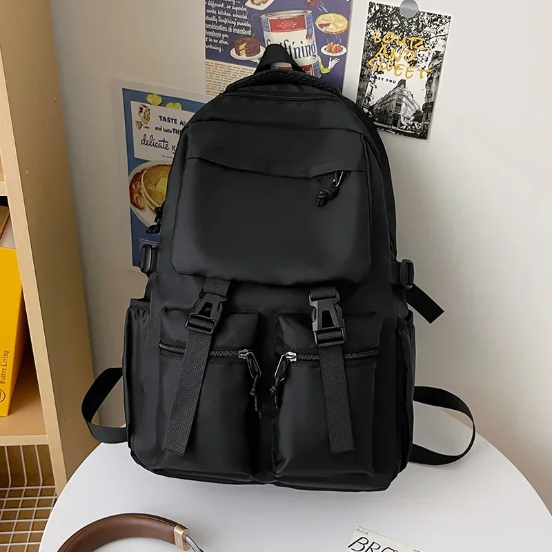 Mochilas de nailon negro con cremallera de alta capacidad, gran oferta, bolso de viaje informal impermeable, nueva mochila escolar sencilla y versátil, 2024