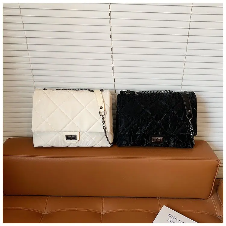 luxury-minimalist-handbag-for-ladies-as-a-shoulder-and-crossbody-bag-with-solid-color-and-letter-logo-as-a-chic-diaper-bag