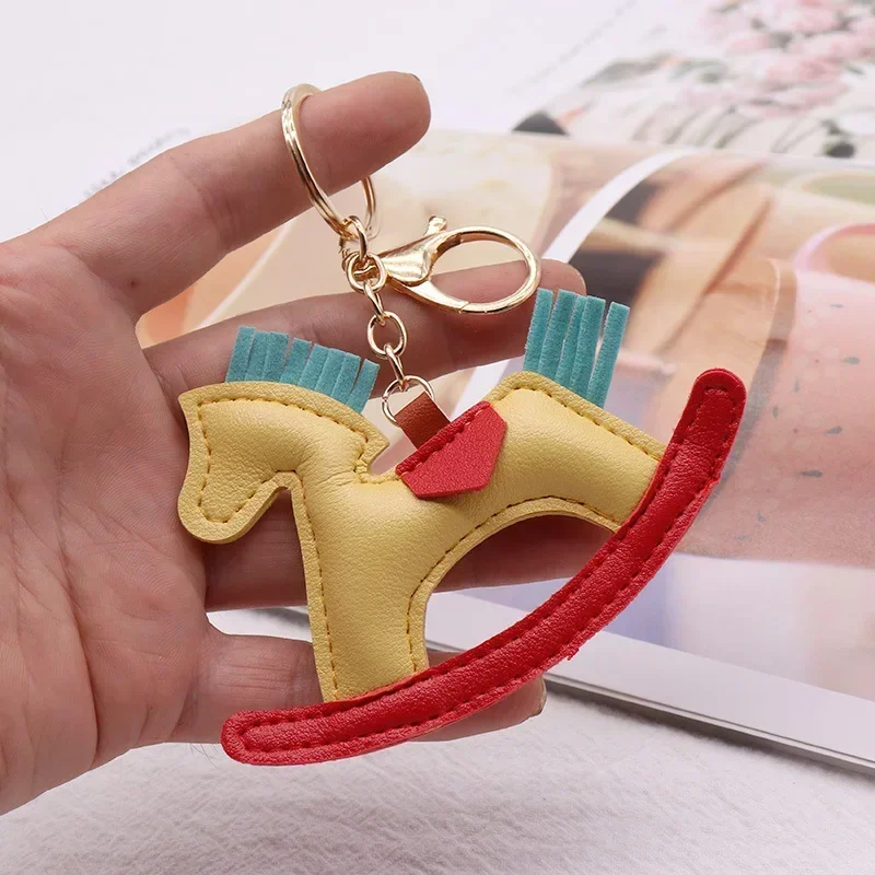 Rotating Rocking Horse Keychain Cotton Filled Genuine Leather Sewn Handmade Artwork Mini Cartoon Bag Fun Pendant Friend Gifts