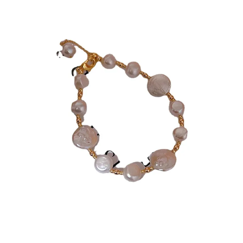 

Button bracelet, high-end fashion simple natural freshwater pearl bracelet