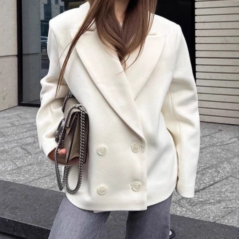 Giacca in lana beige stile denaro vintage francese da donna 2025 Abito doppiopetto allentato di media lunghezza con risvolto invernale