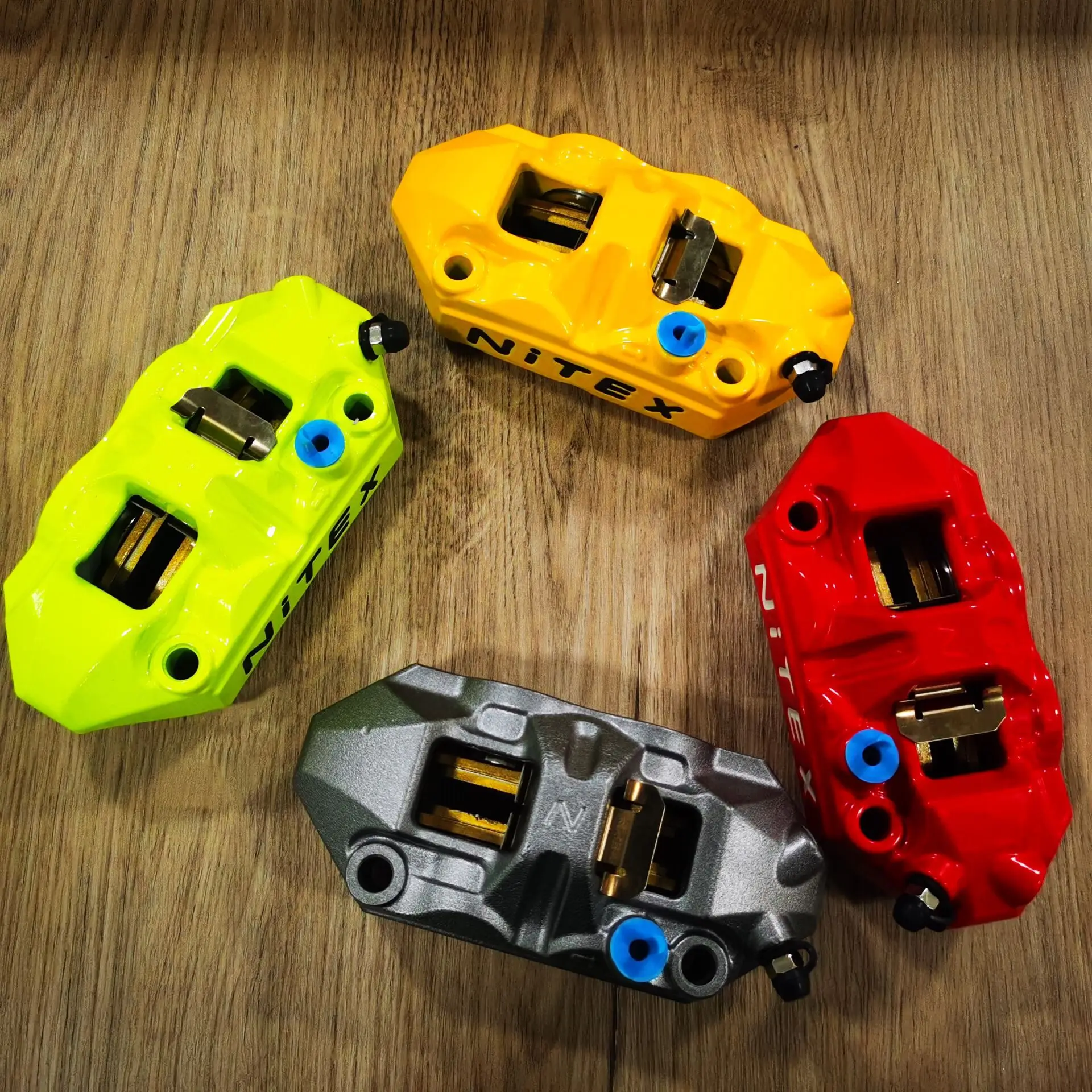 

M40GR motorcycle CNC modified pump 100MM high radiation four piston integrated caliper