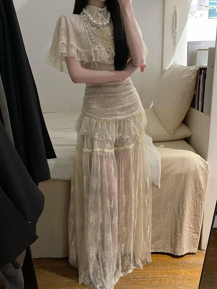 

Temperament Design Lace Cape Lace Top Atmosphere Super Fairy Mesh Skirt Set