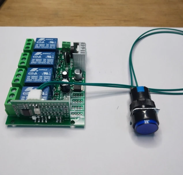 A single mechanical key controls multiple relay boards with 12V24V self-locking dotting functions