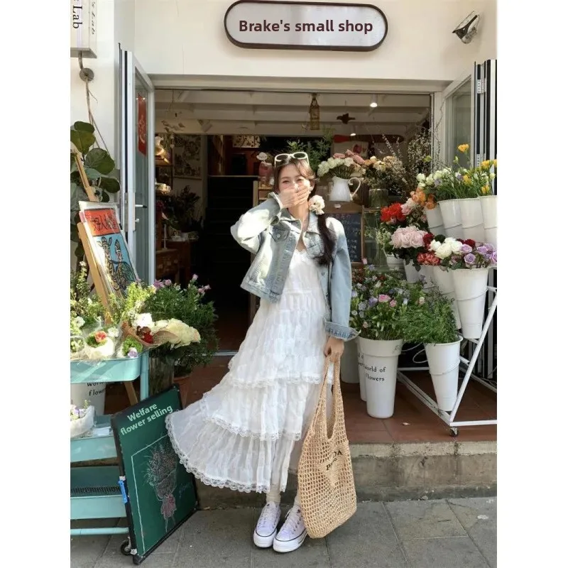 صيف جديد المرأة فستان بحزام عطلة الشاطئ نمط كعكة تنورة فستان شاطئ طويل تصميم الإحساس بلا أكمام مرونة الخصر #1