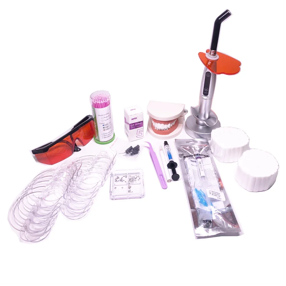 Hot sale professionals tooth gem kit air cures dentals/ curlings light and glue/Dentals decorations kit adhesives tool