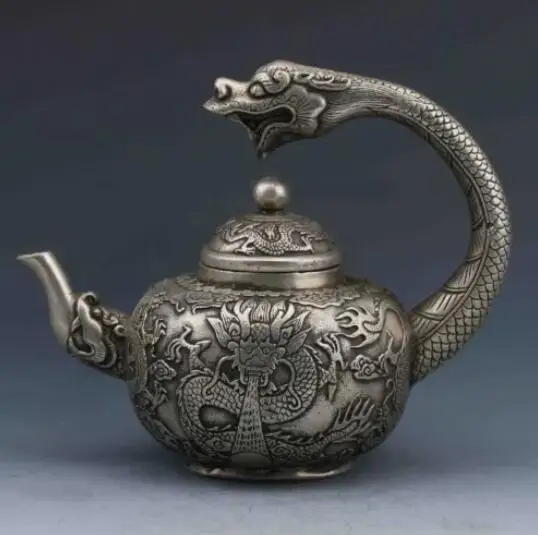 

Collection Chinese Tibetan silver hand-carved dragon teapot w Qianlong Mark