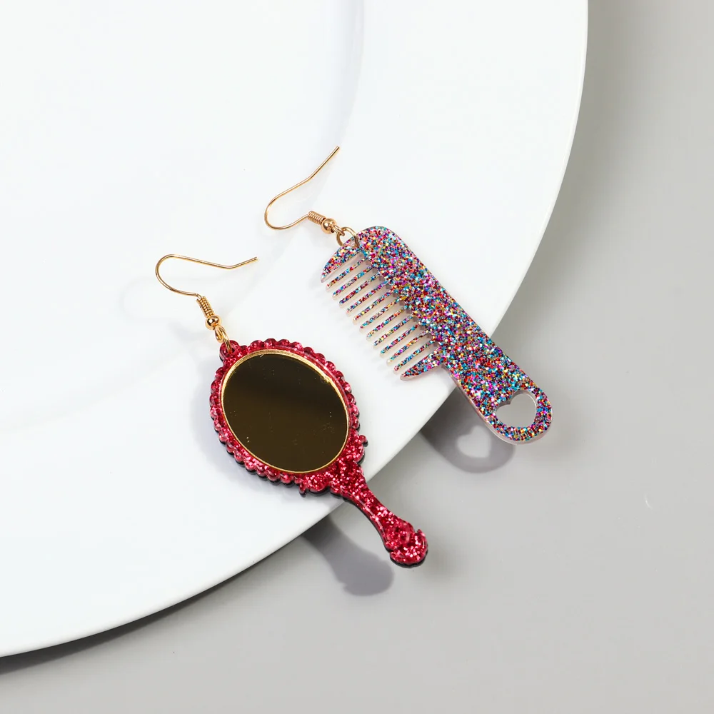 עגילי מברשת ומראה