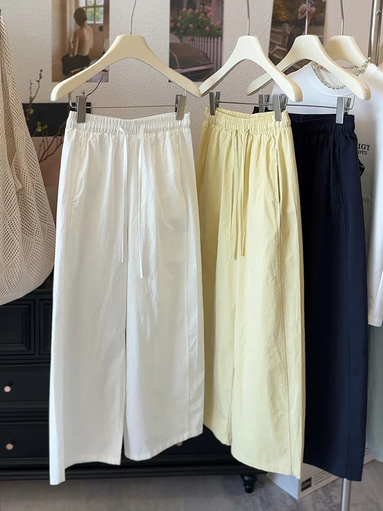 

2025 летние новые широкие брюки, женские свободные брюки с эластичной резинкой на талии, простые однотонные модные повседневные брюки