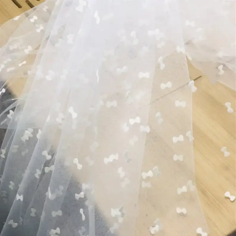 

White Flocked Bow Tulle Fabric Soft Bowknot tulle fabric For Wedding dress, Birthday Dress, Bridal Dress 1 Yard