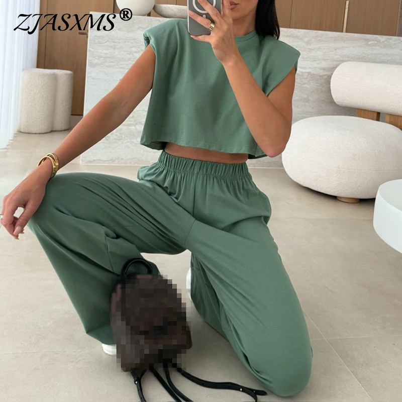 

Новые повседневные комплекты из двух предметов без рукавов с подплечниками, весенний костюм для отпуска, женская одежда, модная однотонная рубашка с круглым вырезом 2025 года, комплект с шортами