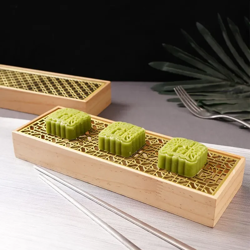 

Creative Wooden Tableware Dessert Tray French Molecular Dishes on The Rectangular Wooden Pallet Dry Ice Box In The Restaurant.