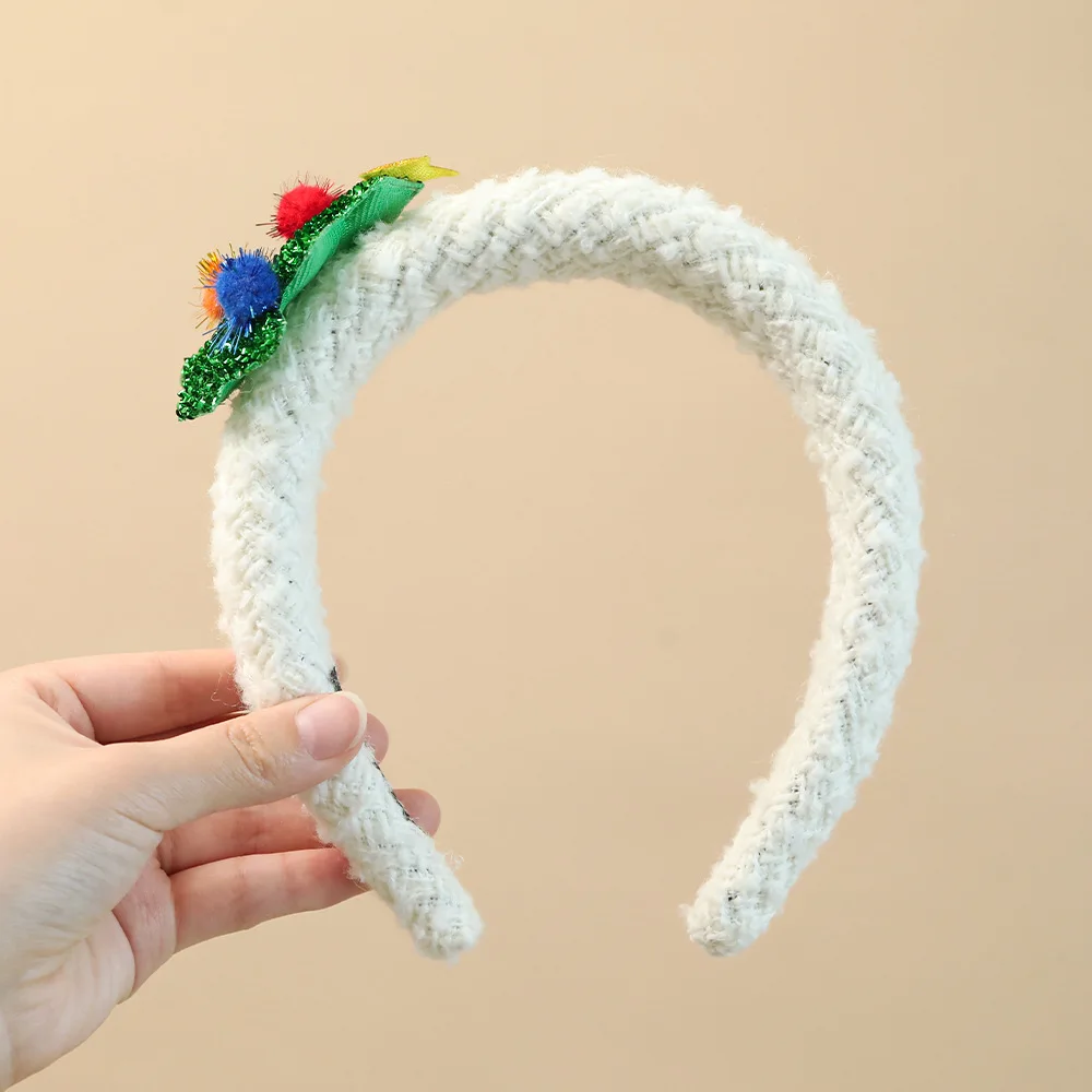 Holiday hair accessories, featuring cartoon characters, hearts, and patterns such as Santa Claus, snowmen, and reindeer