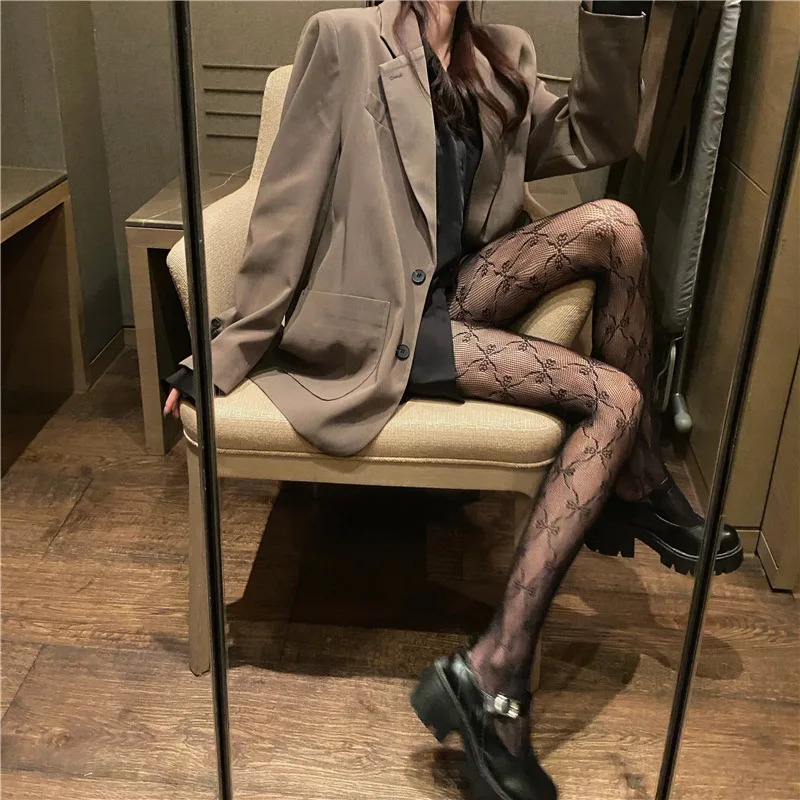 Lolita pizzo scava fuori calze a rete strato base da donna collant sexy collant a rete con nodo a farfalla cava collant morbidi in tinta unita #