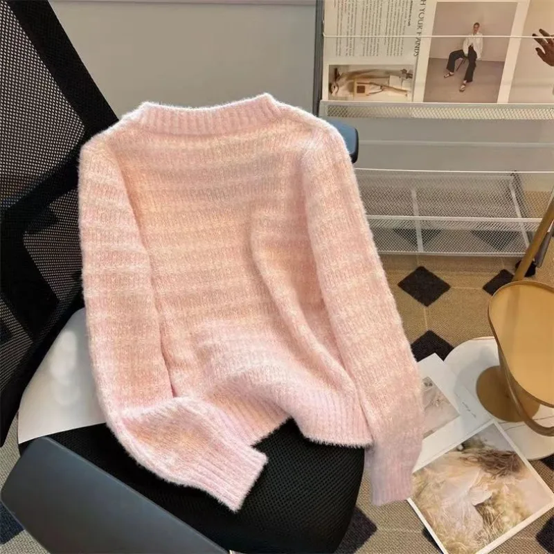 Autumn and winter new soft glutinous knitted cardigan feminine temperament anti-aging short sweater design long sleeved top